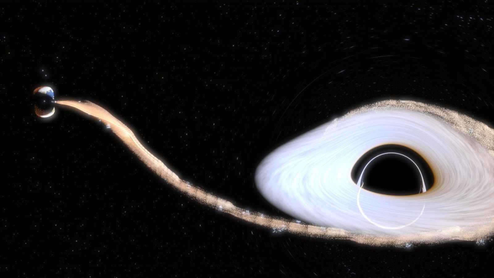 A black hole pulling a planet apart into a glowing stream