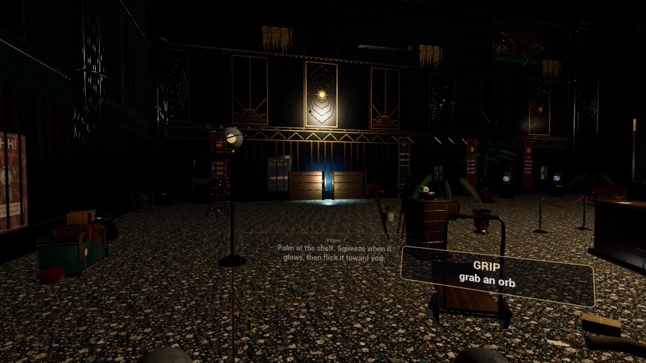 A dim museum room with a brass tag near the hand reading GRIP, grab an orb, and a faint ring of dust motes around an object on a shelf